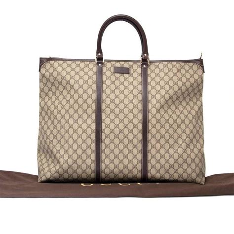 gucci garment bag|Gucci weekender tote.